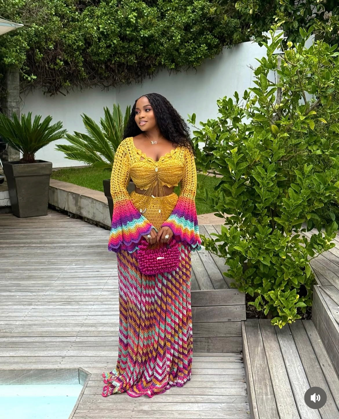 veekee james wearing hookedbylade crochet outfit in yellow and rainbow mix maxi