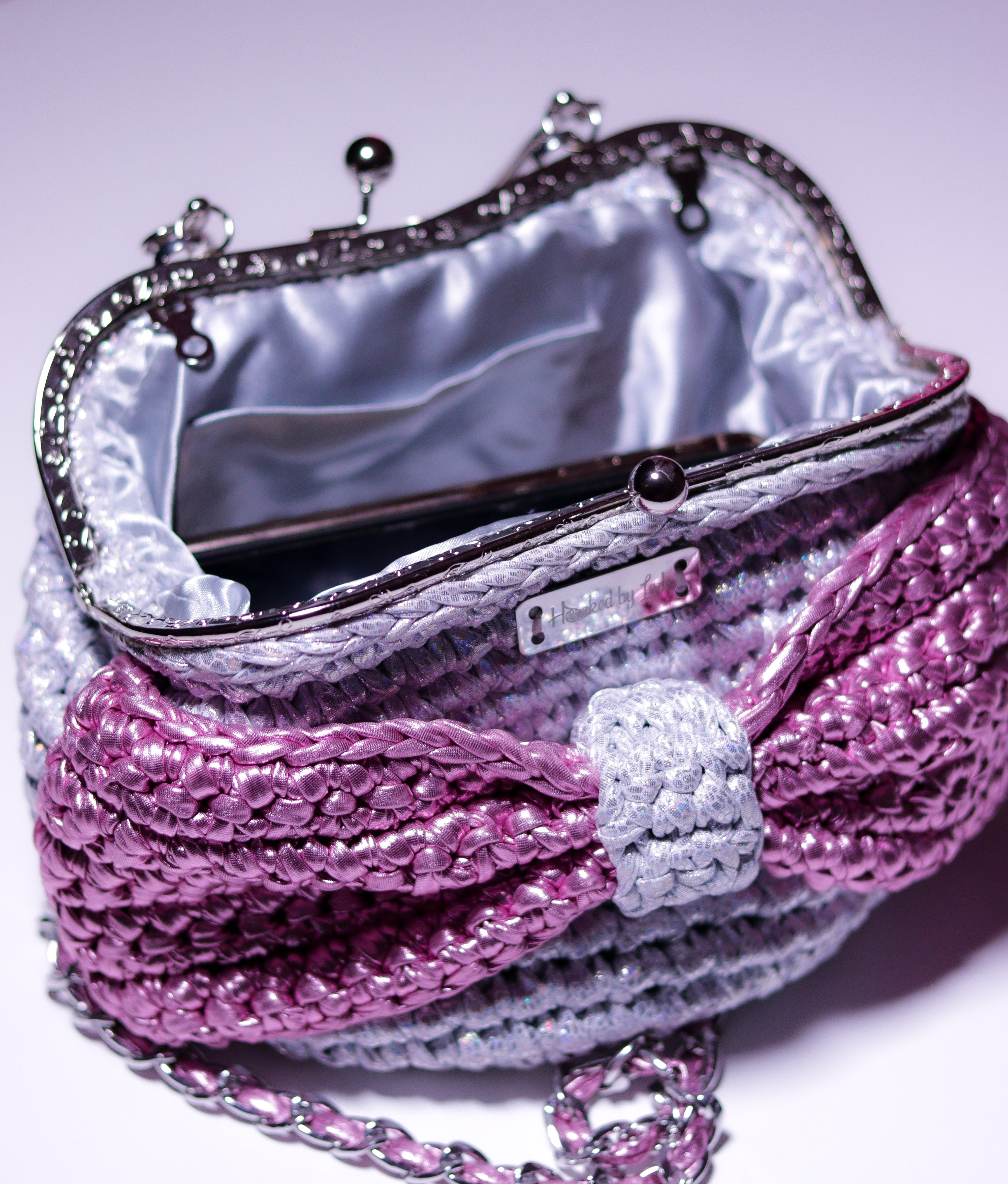 ‘Ajike’ clutch purse (with a pink bow)