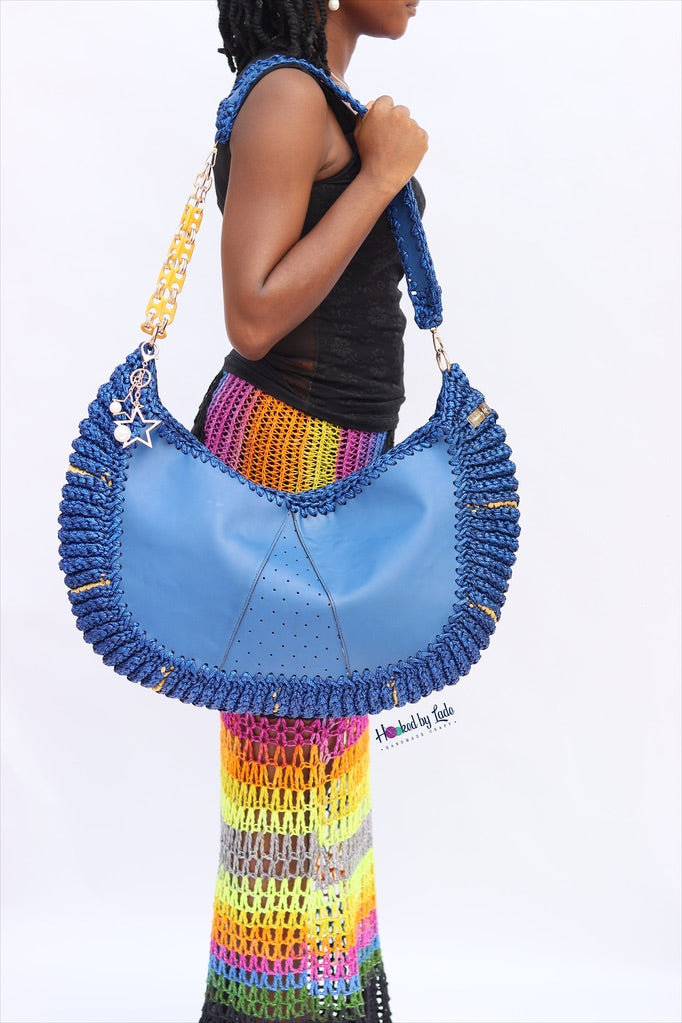 ‘Chidi’ Travel bag in Jean blue leather and Golden streaks