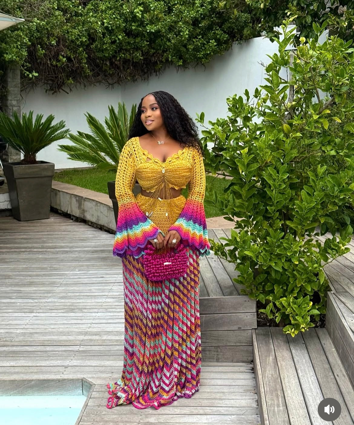 veekee james wearing hookedbylade crochet outfit in yellow and rainbow mix maxi