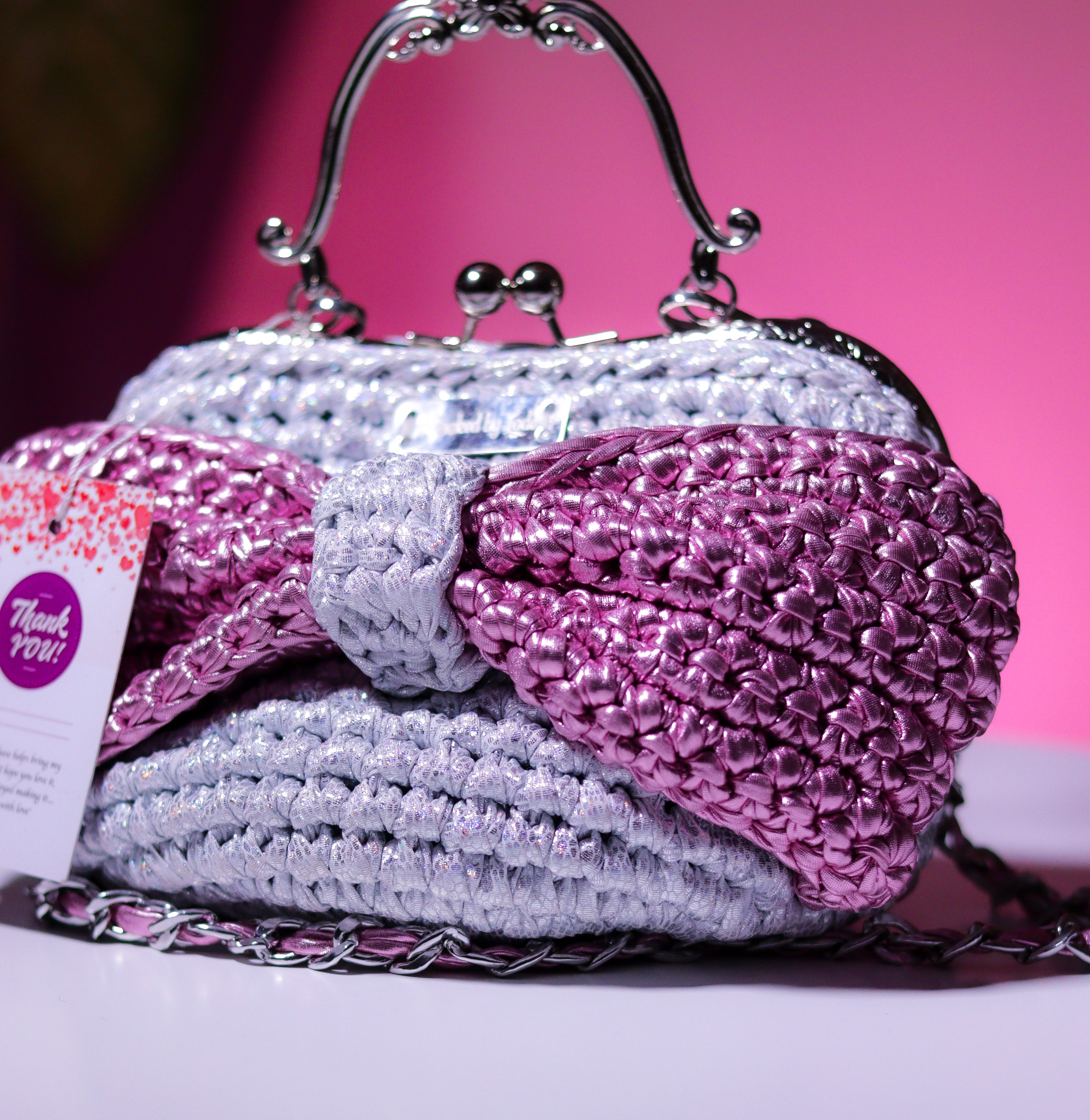 ‘Ajike’ clutch purse (with a pink bow)